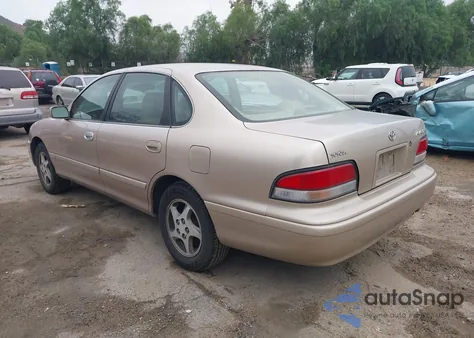 1997 Toyota Avalon Xls z USA, uszkodzony, nr VIN 4T1BF12B8VU199435